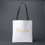 Modern Script Gold Personalized Bridesmaids Tote Bag<br><div class="desc">Modern Script Gold Personalized Bridesmaids Tote Bag featuring personalized bridesmaid's name in gold modern calligraphy font style with title and wedding date in modern sans serif font style on white background. Also perfect for Maid of Honour, Flower Girl, Mother of the Bride and more. Please Note: The foil details are...</div>