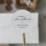 Modern Script Merry Christmas Holiday Classic Round Sticker<br><div class="desc">These modern script Merry Christmas holiday gift stickers are perfect for a minimalist holiday present or holiday card. The simple black and white design features unique industrial lettering typography with modern boho style. Customizable in any colour. Personalize the stickers with your name.</div>