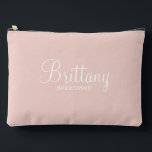 Modern Script Personalized Bridesmaid Accessory Pouch<br><div class="desc">Personalized Bridesmaid Gifts
featuring personalized bridesmaid's name in white modern script font style with title and wedding date in modern sans serif font style on blush pink background.

Also perfect for maid of honour,  mother of the bride,  flower girl and more.</div>