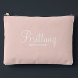 Modern Script Personalized Bridesmaid Accessory Pouch<br><div class="desc">Personalized Bridesmaid Gifts
featuring personalized bridesmaid's name in white modern script font style with title and wedding date in modern sans serif font style on blush pink background.

Also perfect for maid of honour,  mother of the bride,  flower girl and more.</div>