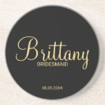 Modern Script Personalized Bridesmaid Coaster<br><div class="desc">Modern Personalized Bridesmaid Coaster featuring personalized bridesmaid's name in gold modern script font style with title and wedding date in modern sans serif font style on black background. Also perfect for Best Man, Groomsmen, Maid of Honour, Flower Girl, Mother of the Bride and more. Please Note: The foil details are...</div>