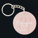 Modern Script Personalized Bridesmaid Keychain<br><div class="desc">Add a personal touch to your wedding with personalized bridesmaid keychain. This keychain features personalized bridesmaid's name in white modern script font style and monogram in blush pink modern script font style as background with title and wedding date in white modern sans serif font style on blush pink background. Also...</div>