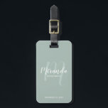 Modern Script Personalized Bridesmaid Luggage Tag<br><div class="desc">Add a personal touch to your wedding with personalized bridesmaid luggage tag. This luggage tag features personalized bridesmaid's name in white modern script font style and monogram in sage green modern script font style as background with title and wedding date in white modern sans serif font style on sage green...</div>