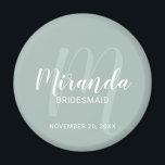 Modern Script Personalized Bridesmaid Magnet<br><div class="desc">Add a personal touch to your wedding with personalized bridesmaid magnet. This magnet features personalized bridesmaid's name in white modern script font style and monogram in sage green modern script font style as background with title and wedding date in white modern sans serif font style on sage green background. Also...</div>