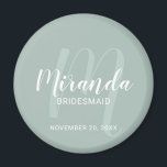 Modern Script Personalized Bridesmaid Magnet<br><div class="desc">Add a personal touch to your wedding with personalized bridesmaid magnet. This magnet features personalized bridesmaid's name in white modern script font style and monogram in sage green modern script font style as background with title and wedding date in white modern sans serif font style on sage green background. Also...</div>