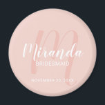 Modern Script Personalized Bridesmaid Magnet<br><div class="desc">Add a personal touch to your wedding with personalized bridesmaid magnet. This magnet features personalized bridesmaid's name in white modern script font style and monogram in blush pink modern script font style as background with title and wedding date in white modern sans serif font style on blush pink background. Also...</div>