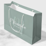 Modern Script Personalized Bridesmaids Large Gift Bag<br><div class="desc">Personalized Bridesmaids Gift Bag featuring personalized bridesmaid's name in white modern script font style and monogram in sage green modern script font style as background with title and wedding date in white modern sans serif font style on sage green background. Also perfect for maid of honour, flower girl, mother of...</div>