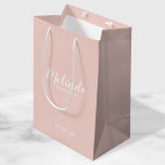 Modern Script Personalized Bridesmaids Medium Gift Bag<br><div class="desc">Modern Script Personalized Bridesmaids Gift Bag
featuring personalized bridesmaid's name in white modern script font style with title and wedding date in modern sans serif font style on blush pink background.

Also perfect for Maid of Honour,  Flower Girl,  Mother of the Bride and more.</div>