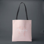Modern Script Personalized Bridesmaids Tote Bag<br><div class="desc">Add a personal touch to your wedding with personalized bridesmaids gift tote bag. This tote bag features personalized bridesmaid's name in white modern script font style and monogram in blush pink modern script font style as background with title and wedding date in white modern sans serif font style on blush...</div>