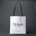 Modern Script Personalized Bridesmaids Tote Bag<br><div class="desc">Modern Script Personalized Bridesmaids Tote Bag
featuring personalized bridesmaid's name in black modern script font style with title and wedding date in modern sans serif font style on white background.

Also perfect for Maid of Honour,  Flower Girl,  Mother of the Bride and more.</div>