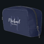 Modern Script Personalized Groomsman Monogram Name Dopp Kit<br><div class="desc">Add a personal touch to your wedding with personalized groomsman gift. This design features personalized groomsman's name in white modern script font style and monogram in light navy blue modern script font style as background with title in white modern sans serif font style on navy blue background. Also perfect for...</div>