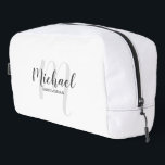 Modern Script Personalized Groomsman Monogram Name Dopp Kit<br><div class="desc">Add a personal touch to your wedding with personalized groomsman gift. This design features personalized groomsman's name in grey modern script font style and monogram in light grey modern script font style as background with title in grey modern sans serif font style on white background. Also perfect for maid of...</div>