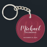 Modern Script Personalized Groomsmen Monogram&Name Keychain<br><div class="desc">Add a personal touch to your wedding with personalized groomsmen keychain. This keychain features personalized groomsmen's name in white modern script font style and monogram in light burgundy red modern script font style as background with title and wedding date in white modern sans serif font style on burgundy red background....</div>