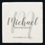 Modern Script Personalized Groomsmen Stone Coaster<br><div class="desc">Add a personal touch to your wedding with personalized groomsmen stone coaster. This coaster features personalized groomsmen's name in grey modern script font style and monogram in light grey modern script font style as background with title and wedding date in grey modern sans serif font style. Also perfect for best...</div>