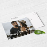 Modern Script Wedding Postponement Date Change Postcard<br><div class="desc">Modern Script Wedding Postponement or Date Change Postcard featuring your photo and trendy script lettering. There is an optional filter to help set off the white text at the bottom; it can be turned on or off by clicking "customize further" and deleting that layer. If you need assistance or matching...</div>
