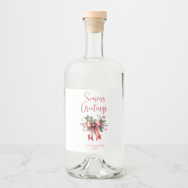 Modern Seasons Greetings Script Holly Bow Liquor Bottle Label (Front)