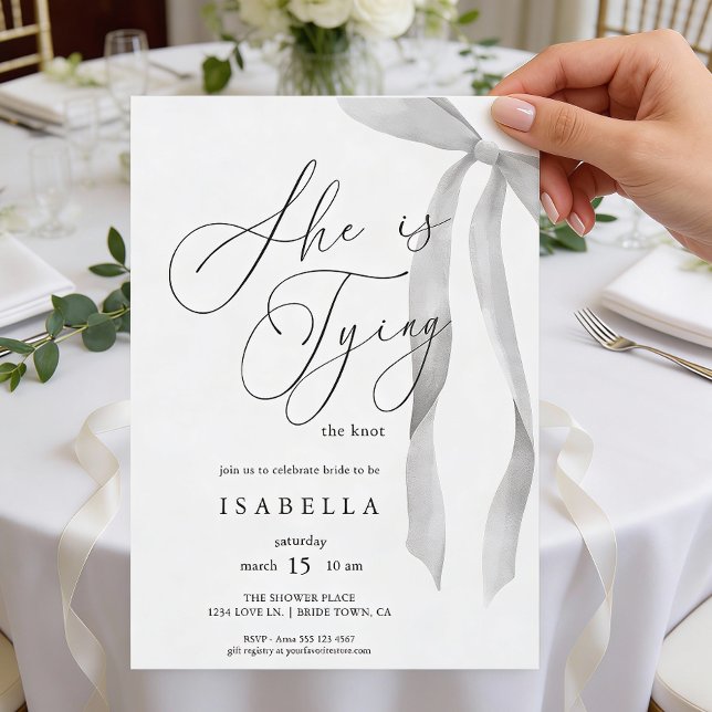 Modern She's Tying The Knot Bow Bridal Shower Invitation (Front of invite shown in 5 x 7 inches, choose size, paper, and corner style.
)