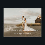 Modern Signature Script Wedding Photo Thank You Postcard<br><div class="desc">Elegant "Thank You" modern signature script in white,  wedding photo thank you postcard. Back of card features watercolor wildflower arrangement and multiple template text lines for names,  address and message.</div>