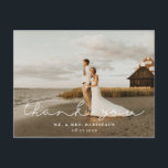 Modern Signature Script Wedding Photo Thank You Postcard<br><div class="desc">Elegant "Thank You" modern signature script in white,  wedding photo thank you postcard. Back of card features watercolor wildflower arrangement and multiple template text lines for names,  address and message.</div>