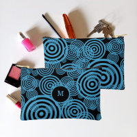 Modern, trendy blue circles on black monogram 