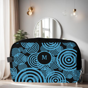 Modern, trendy blue circles on black monogram dopp kit