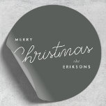 Modern Trendy Christmas | Forest Green Dark Dusky Classic Round Sticker<br><div class="desc">A trendy stylish holiday stickers with modern and handwritten script typography in white on a deep smoky green gray color. The name can be easily customized for a personal touch. A simple,  minimalist and contemporary christmas design to stand out this holiday season!</div>