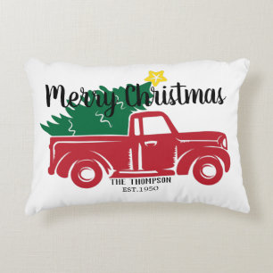 Modern vintage red truck with pine tree green accent pillow