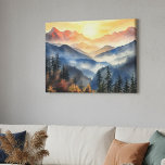 Modern Watercolor Mountain Sunset Landscape Canvas Print<br><div class="desc">Bring the beauty of nature into your home with this breathtaking stretched canvas wall art, featuring a glowing mountain sunset painted in soft watercolor tones. Layers of misty blue ridges fade into the distance while the fiery sky radiates rich shades of orange, gold, and rose. The foreground of evergreens and...</div>