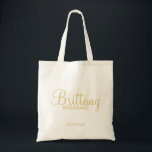Modern White and Gold Personalized Bridesmaids Tote Bag<br><div class="desc">Modern Personalized Bridesmaids Gifts featuring personalized bridesmaid's name in gold modern script font style with title and wedding date in gold modern sans serif font style. Also perfect for Maid of Honour, Flower Girl, Mother of the Bride and more. Please Note: The foil details are simulated in the artwork. No...</div>