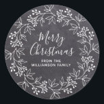 Modern White Christmas Wreath Black Chalkboard Classic Round Sticker<br><div class="desc">This black and white Christmas sticker takes the traditional chalkboard style and adds a modern touch. The Christmas wreath is drawn in the popular open style. Merry Christmas is also written in a contemporary font. Your name is below. Easy-to-use template. All of the text can be quickly changed.</div>