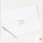 Modern White Wedding Thank You Classic Round Sticker<br><div class="desc">A small white round sticker features "thank you" in a chic black handwritten script with your names below,  perfect for any wedding occasion - reception,  rehearsal dinner,  engagement party,  couple's shower and more.</div>