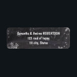 Modern winter snowflakes chalkboard wedding<br><div class="desc">Modern winter snowflakes chalkboard wedding address label. Stylish,  elegant and original black chalkboard with white snowflakes background. A black and white elegant wedding theme perfect for winter wonderland,  Christmas wedding theme.The text is fully customizable</div>