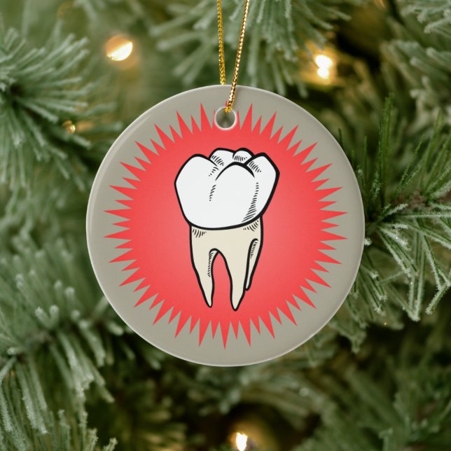 Molar freshly extracted on a red starburst ceramic ornament (Tree)