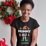 Mommy elf family matching christmas outfit name T-Shirt<br><div class="desc">Get into the holiday spirit with this fun Mommy elf t-shirt which is part of a matching family elf outfit collection containing gifts for any member of the family. Perfect for any Christmas family reunion, this t-shirt features a cute elf hat and fun legs, with the caption "Mommy elf" in...</div>