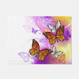 Monarch Butterflies on Purple Background Doormat