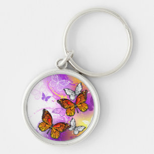 Monarch Butterflies on Purple Background Keychain