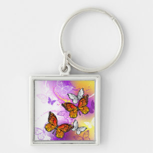 Monarch Butterflies on Purple Background Keychain