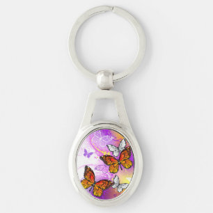 Monarch Butterflies on Purple Background Keychain