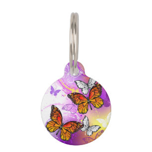 Monarch Butterflies on Purple Background Pet Tag