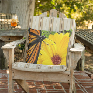 Monarch butterfly on calendula flower outdoor pillow