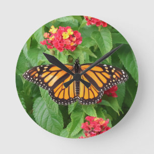 Monarch Butterfly on Lantana Round Clock