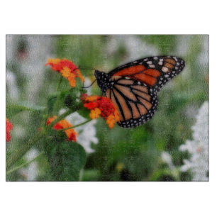 Monarch Butterfly on Orange and Red Lantana Cutting Board