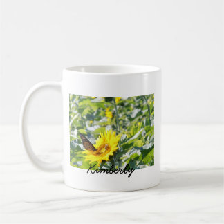 Monarch butterfly on sunflower coffee mug