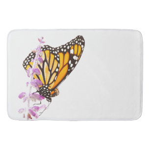 Monarch perched on lavender bath mat