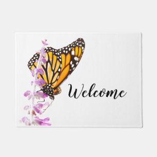Monarch perched on lavender doormat