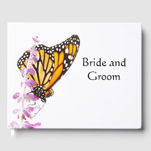 Monarch perched on lavender guest book