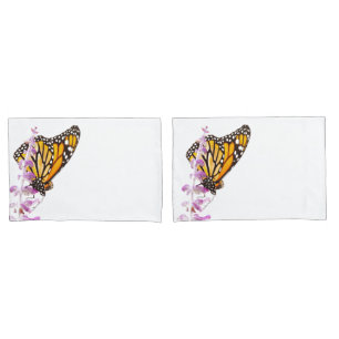 Monarch perched on lavender pillowcase