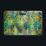 Monet Flower Garden Badge<br><div class="desc">Badge featuring Claude Monet’s oil painting The Artist's Garden at Vétheuil (1880). Sunflowers and other beautiful blue and red flowers line a garden path where children are taking a pleasant stroll. A great gift for fans of impressionism and French art.</div>
