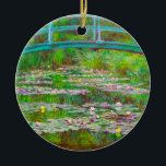 Monet Japanese Bridge and Water Lilies Ceramic Ornament<br><div class="desc">Ornament featuring Claude Monet’s oil painting of a Japanese bridge and flowers. Beautiful water lilies and bridge inspired by the artist’s garden and pond in Giverny. A great Monet gift for fans of impressionism and French art.</div>