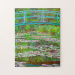 Monet Japanese Bridge and Water Lilies Jigsaw Puzzle<br><div class="desc">Puzzle featuring Claude Monet’s oil painting of a Japanese bridge and flowers. Beautiful water lilies and bridge inspired by the artist’s garden and pond in Giverny. A great Monet gift for fans of impressionism and French art.</div>